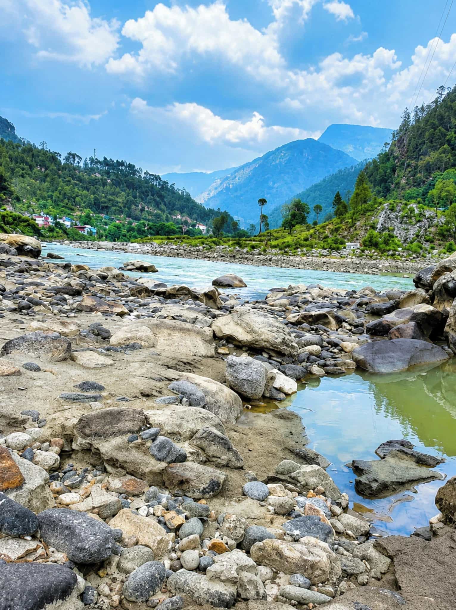 Panoramic view of the Bhagirathi River and surrounding Himalayan mountains in Uttarkashi